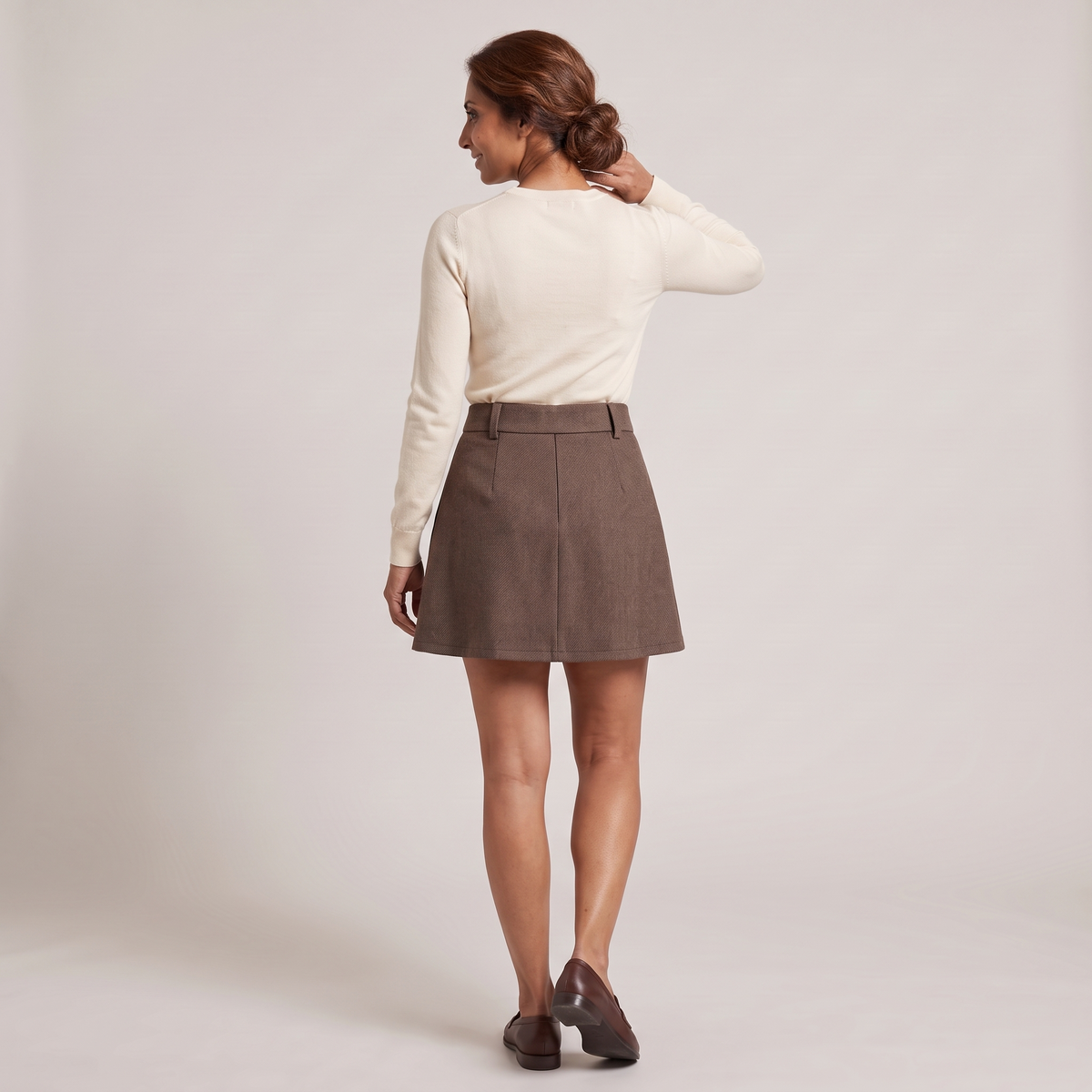 Jupe tailleur courte plissée hermine